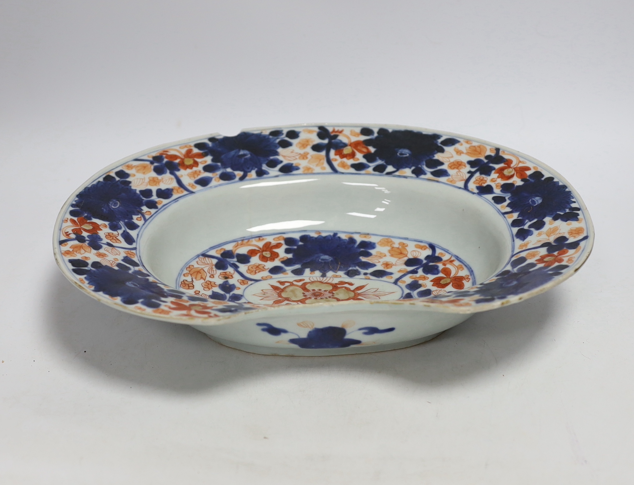 An 18th century Chinese Imari barber's shaving bowl, 33cm wide